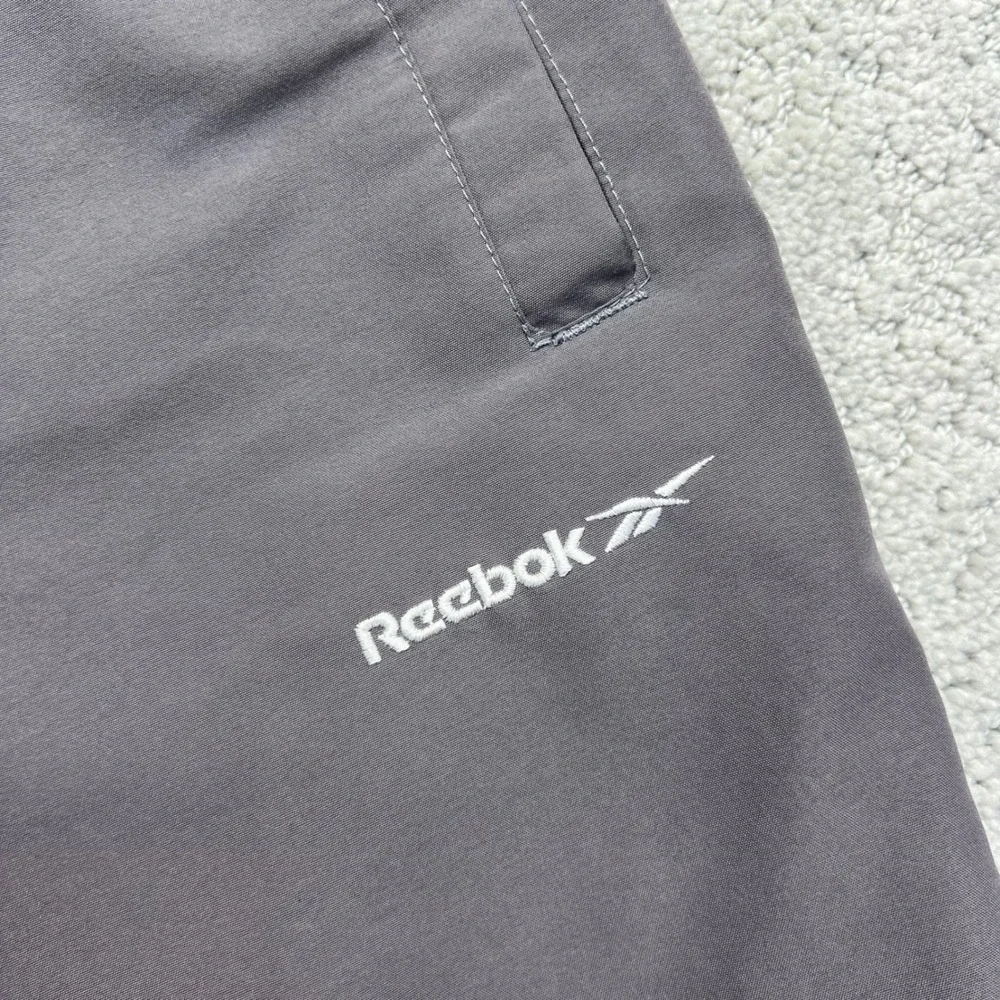 VINTAGE 90s Reebok Track Pants Womens Small Grey Faded Tapered Lined Ankle Zip